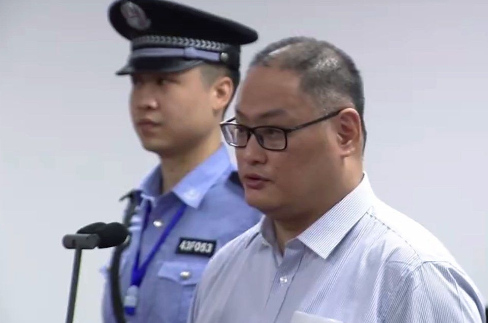 Activist who was imprisoned in China returns to Taiwan